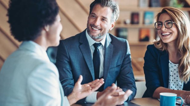 Business persons talking in the office