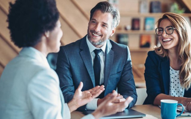 Business persons talking in the office