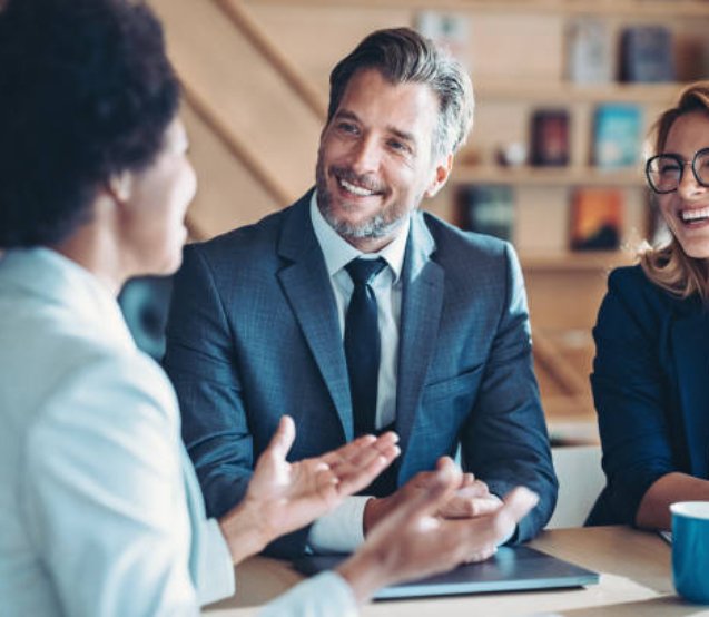 Business persons talking in the office